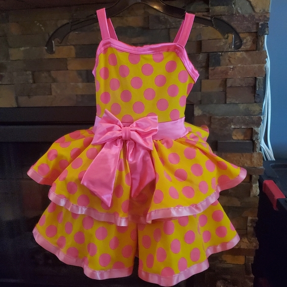Yellow and pink polka-dot dance costume